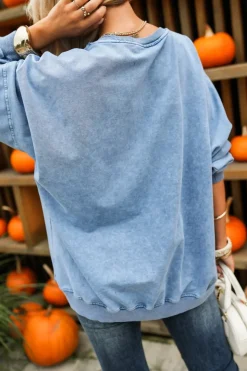 BLUZA BAWEŁNIANA DEKATYZOWANA Z OZDOBNYM KWIATEM NIEBIESKA