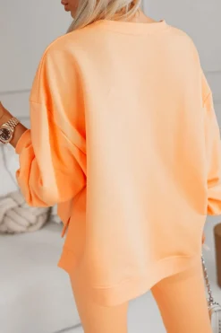 BLUZA BAWEŁNIANA MERRY OVERSIZE ASYMETRYCZNA Z ROZCIĘCIAMI PO BOKACH POMARAŃCZOWA