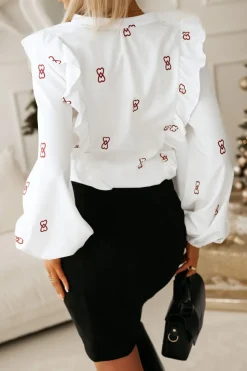 BLUZKA KOSZULOWA Z OZDOBNĄ FALBANKĄ BIAŁA W BURGUNDOWE SERCA